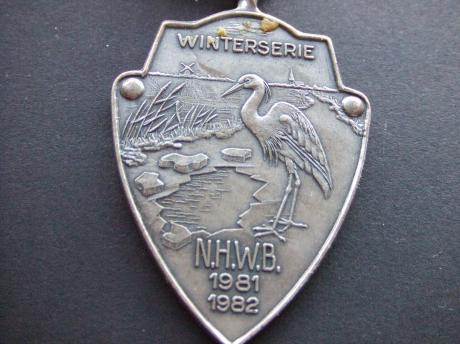 N.H.W.B.(Noord-Hollandse Wandelbond) reiger aan het vissen winterserie 1981-1982